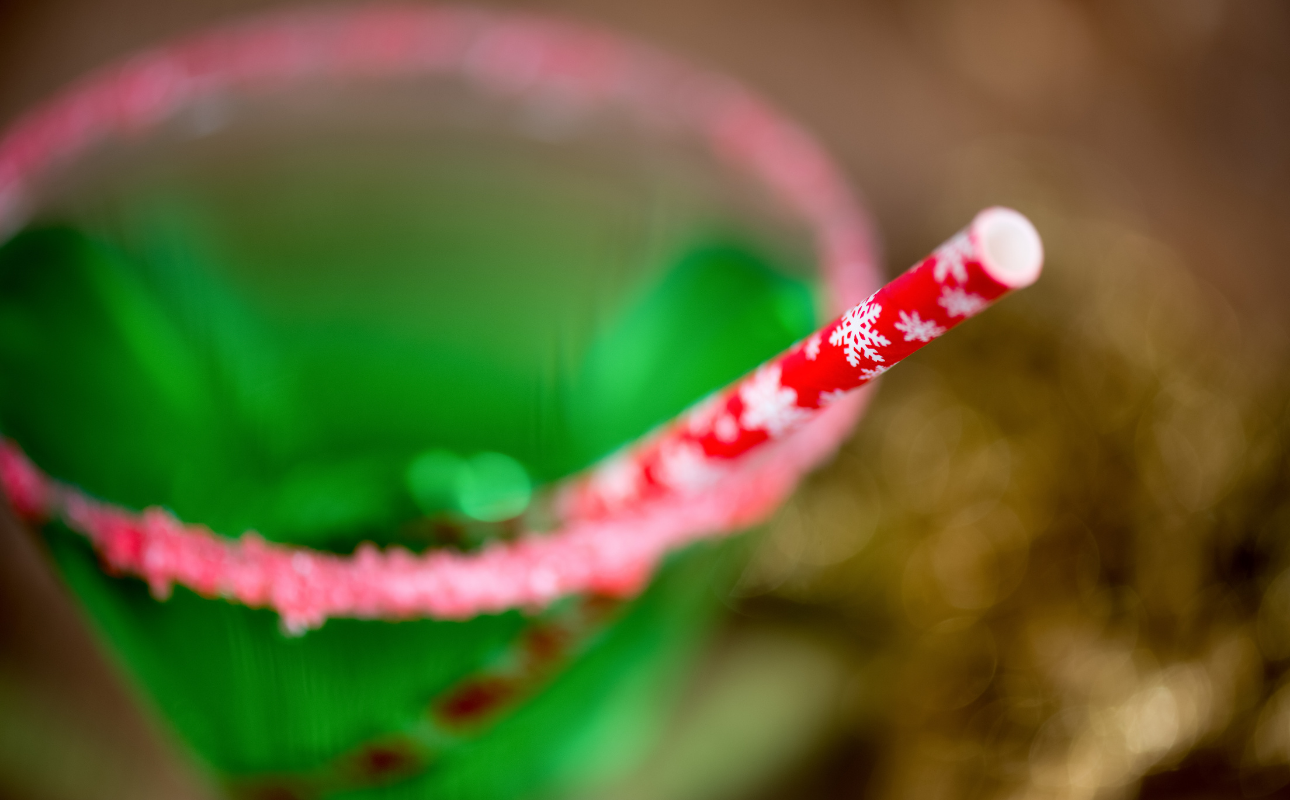 Christmas party planner event with Wicked themed pink and green christmas cocktail